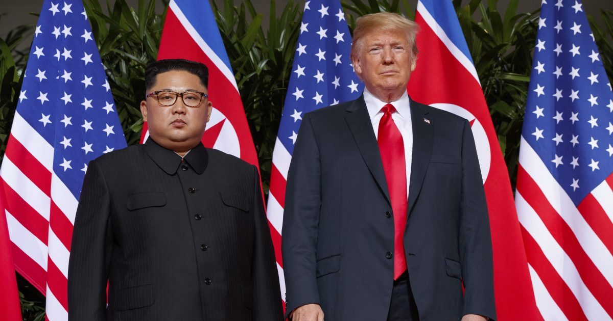 In this June. 12, 2018, file photo, U.S. President Donald Trump, right, meets with North Korean leader Kim Jong Un on Sentosa Island, in Singapore. North Korea has warned on Friday, Nov. 2, 2018, it could revive a state policy aimed at strengthening its nuclear arsenal if the United States does not lift economic sanctions against the country.