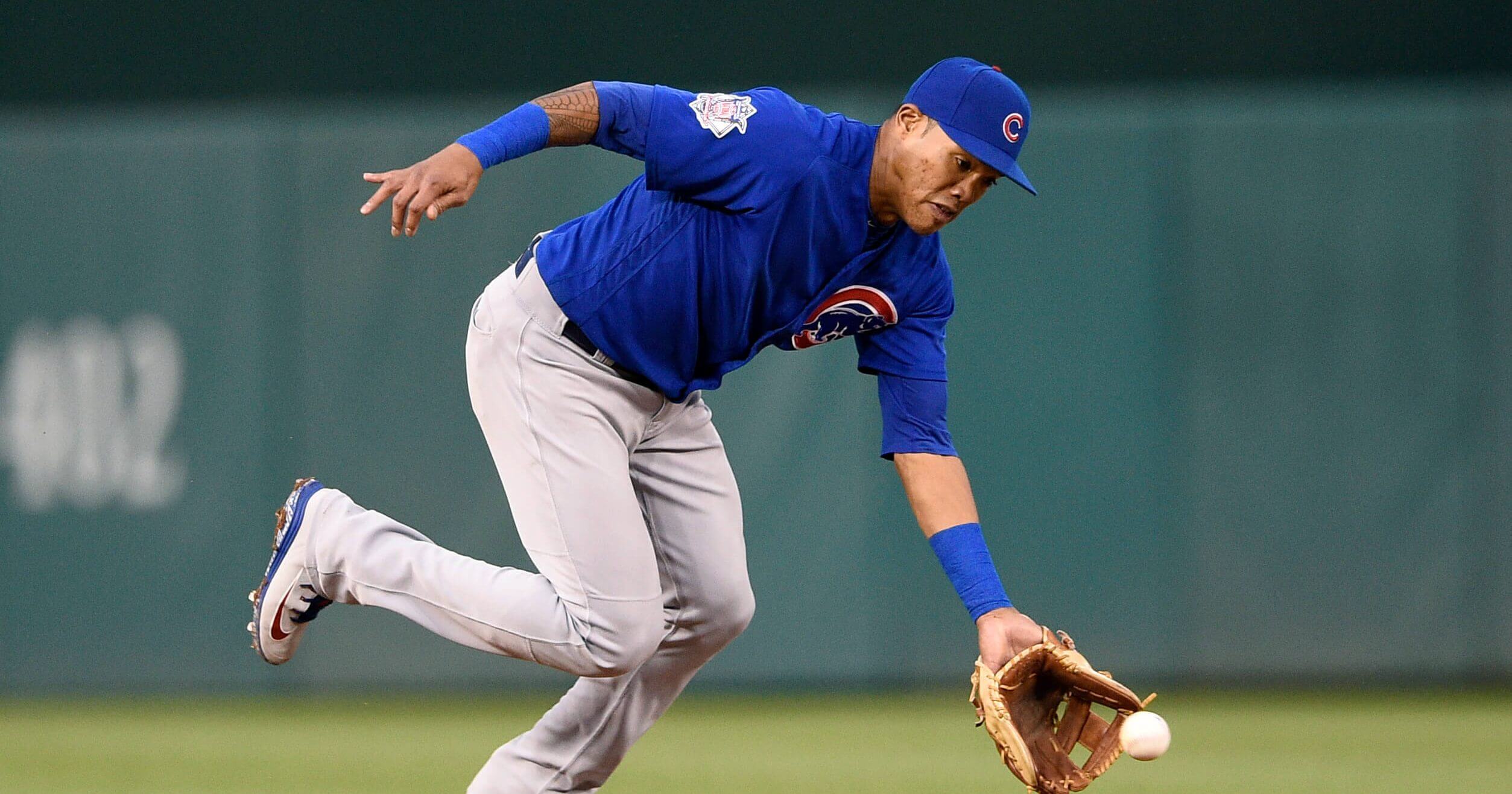 Chicago Cubs shortstop Addison Russell fields a ground ball during a Sept. 8 game against they Washington Nationals.