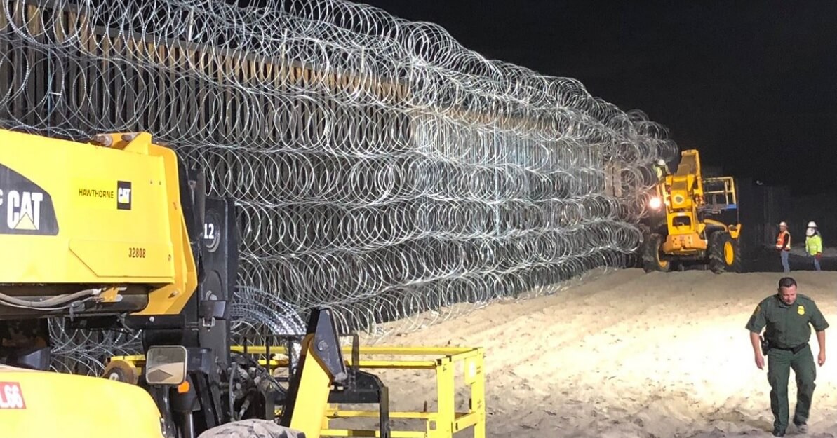 Coils of barbed wire on the U.S. side of the border fence separating the country from Mexico are meant to deter potential illegal aliens who would think about trying to climb over.