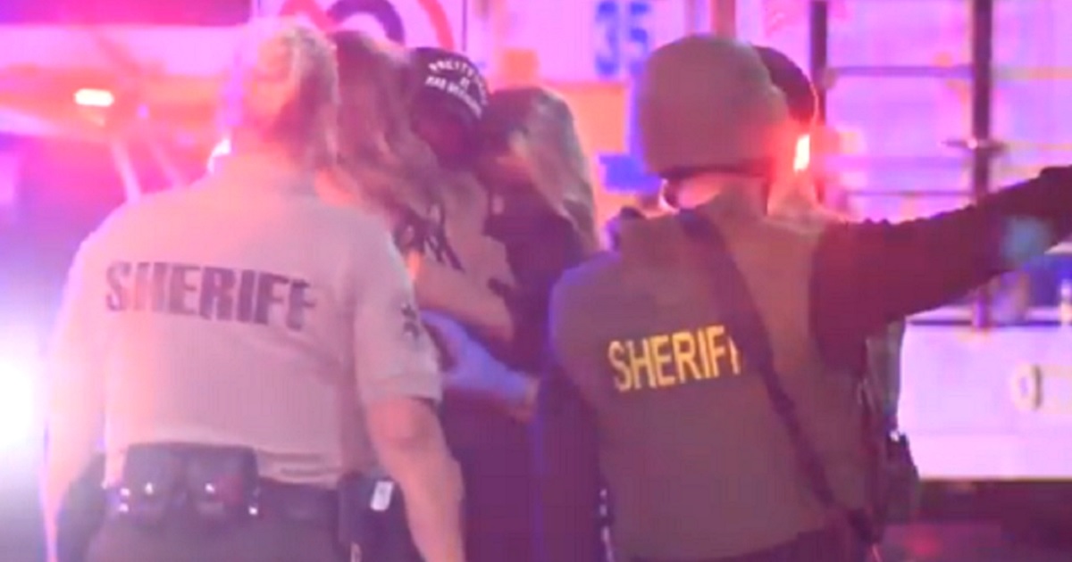 Personnel from the Ventura County Sheriff's Office respond to the scene of a bar shooting late Wednesday that left a total of 13 dead, including a Ventura County sheriff's sergeant and the gunman.