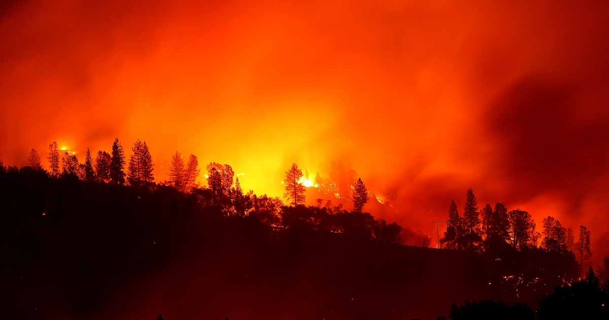 The Camp Fire burns in the hills on Nov. 11, 2018, near Oroville, California.