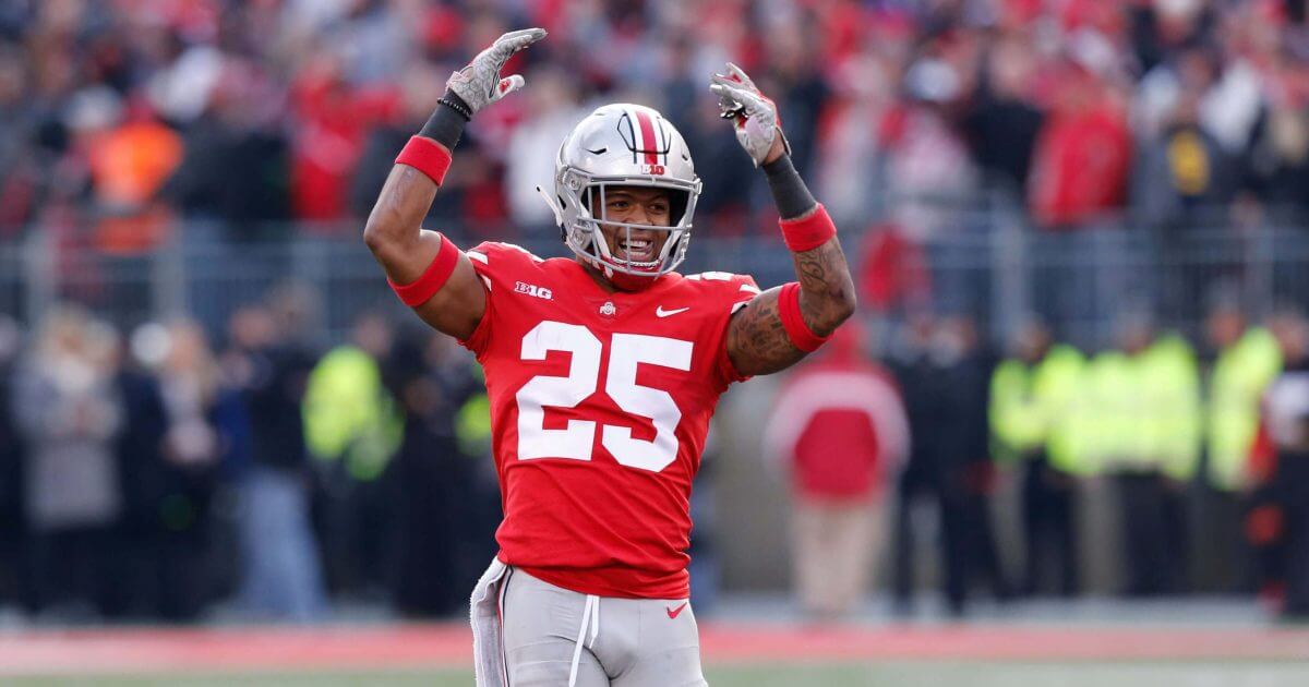 Ohio State defensive back Brendon White celebrates after making a tackle against Michigan on Saturday.