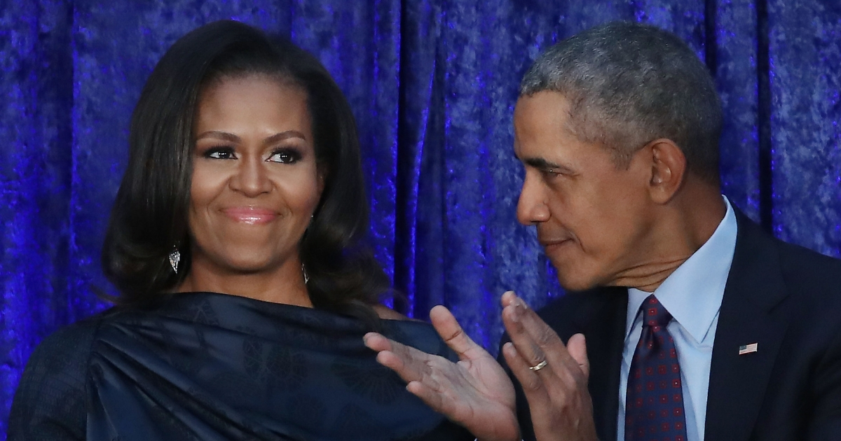 Former U.S. President Barack Obama and first lady Michelle Obama