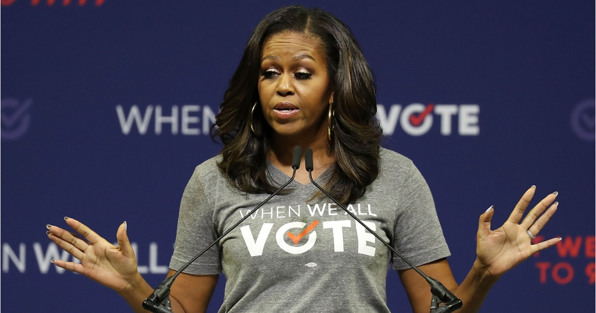 Former first lady Michelle Obama speaks during a When We All Vote's National Week of Action rally.