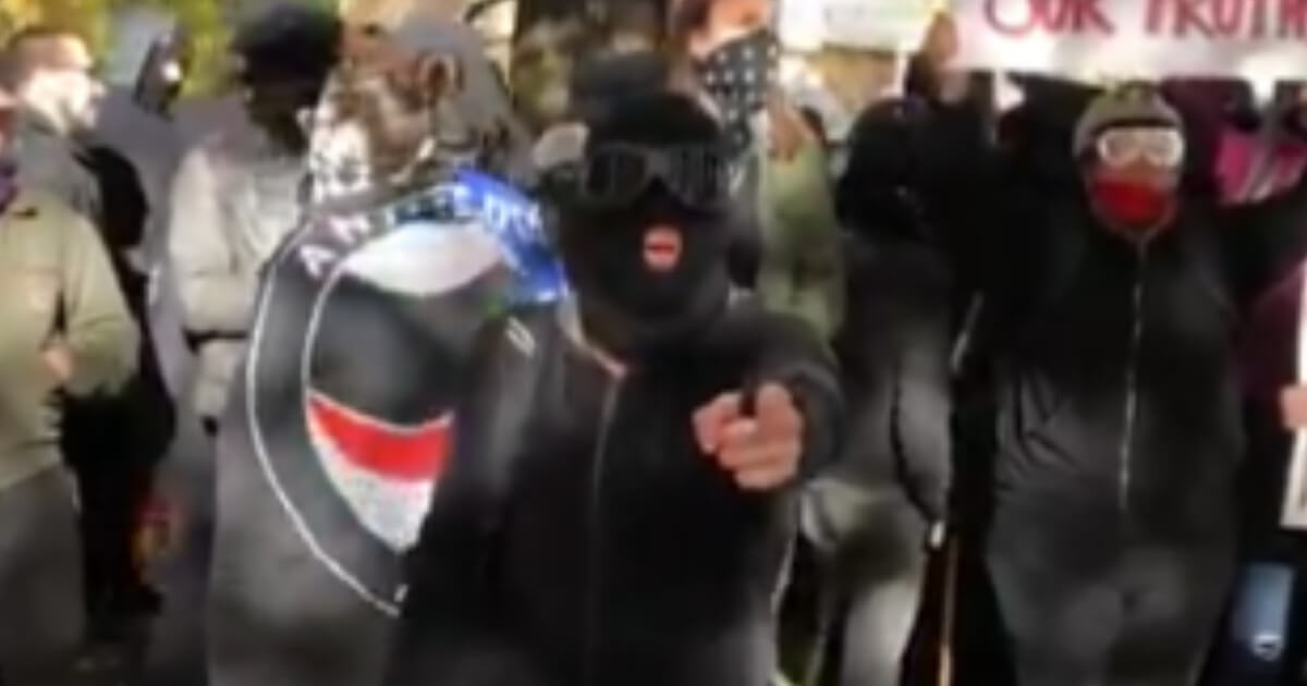 Antifa members make threats at a video journalist