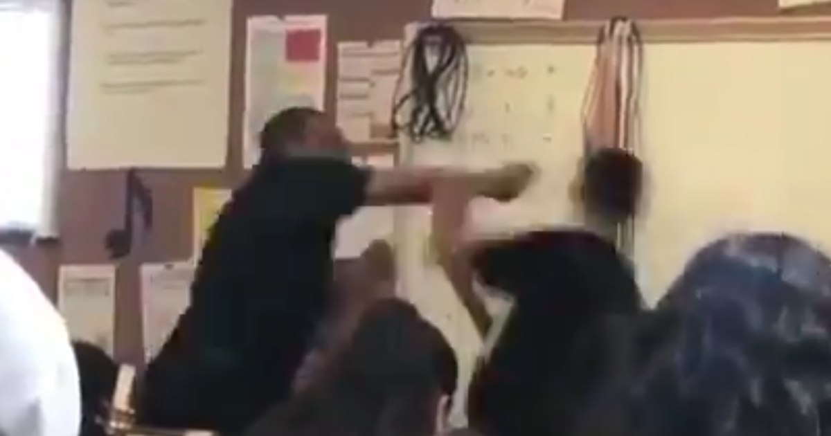 Teacher punches student