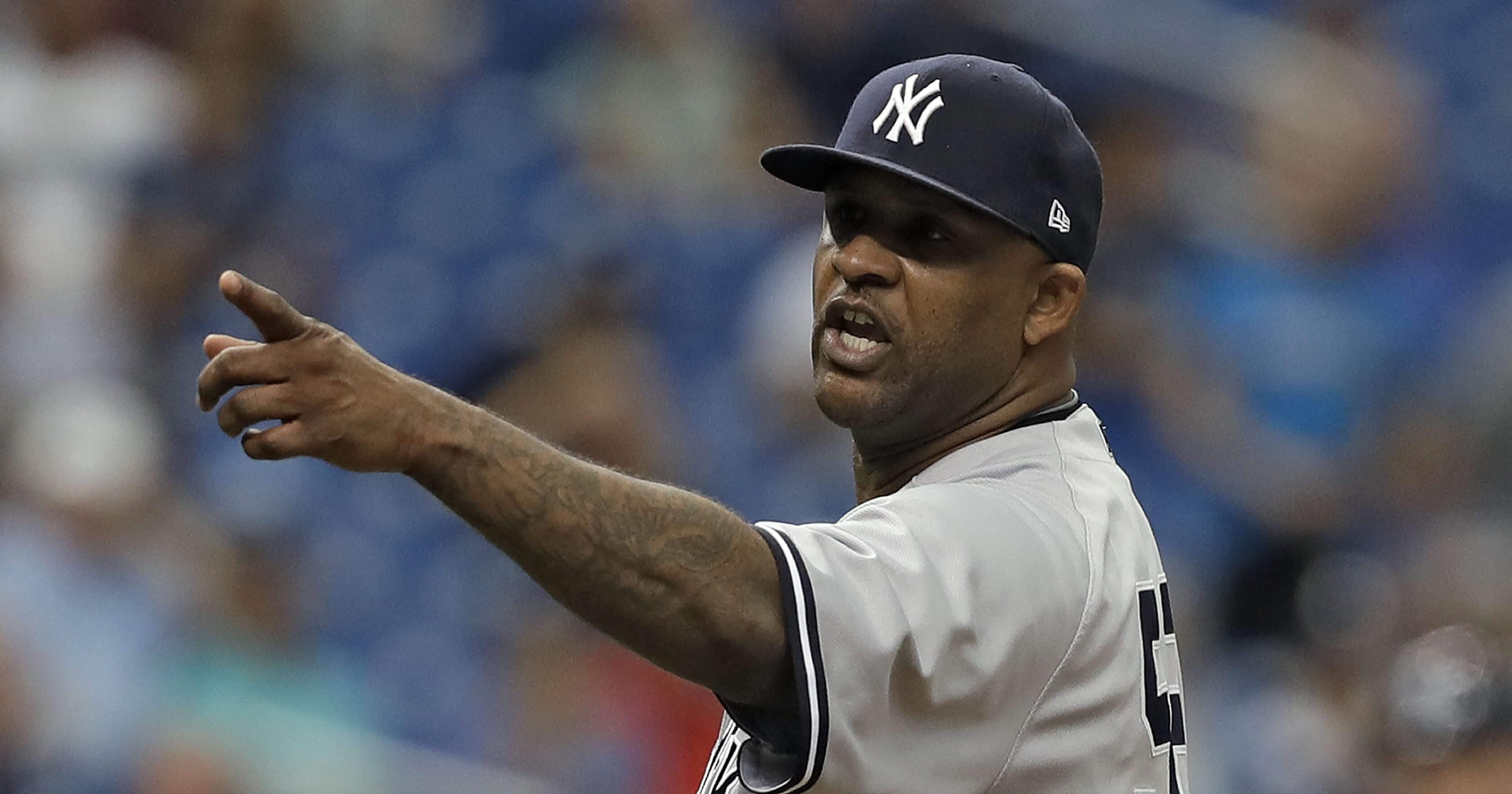 New York Yankees pitcher C.C. Sabathia points at the Tampa Bay dugout after he was ejected for hitting the Rays' Jesus Sucre with a pitch during the sixth inning of a Sept. 27 game in St. Petersburg.