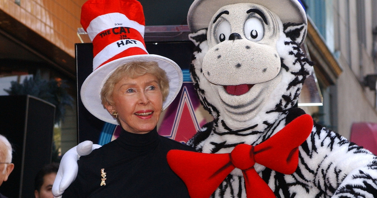 Audrey Geisel, the widow of Dr. Seuss creator Theodore Geisel, poses with the Cat In The Hat at a ceremony honoring the late children's book author with a star on the Hollywood Walk of Fame on March 11, 2004, in Hollywood , California.