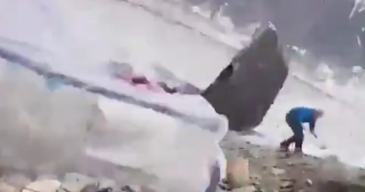 A mountain climber in Pakistan narrowly avoids getting hit by a massive boulder that tore through his group's base camp.