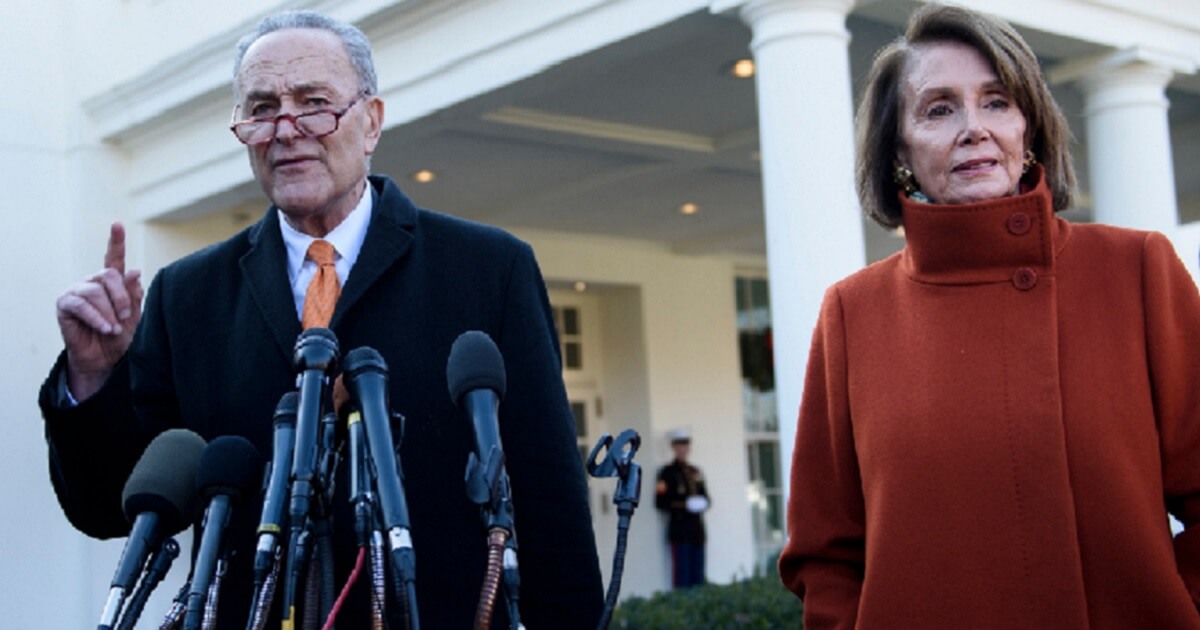 Senate Minority Leader Chuck Schumer and House Minority Leader Nancy Pelosi address the media after meeting with President Donald Trump in the White House on Tuesday.