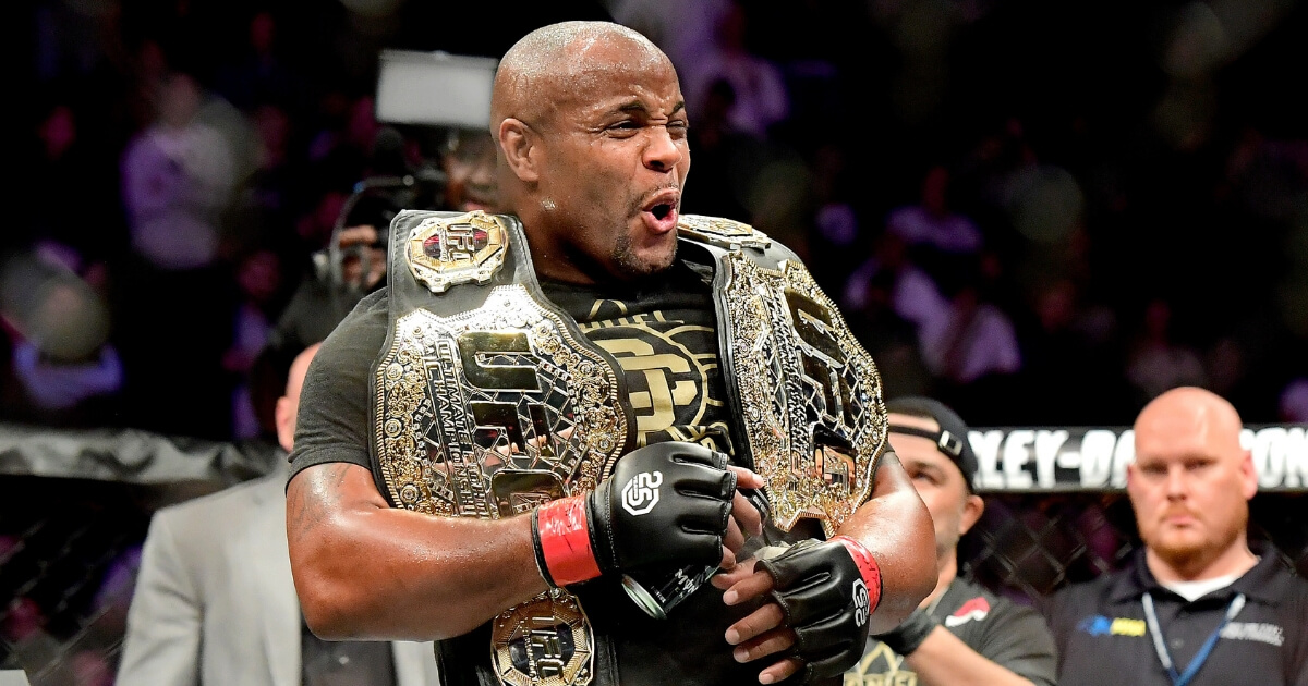 Daniel Cormier celebrates his victory over Derrick Lewis in their heavyweight title bout during UFC 230 at New York's Madison Square Garden on Nov. 3.