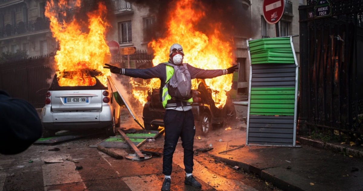 Protesters clash with riot police in Paris.