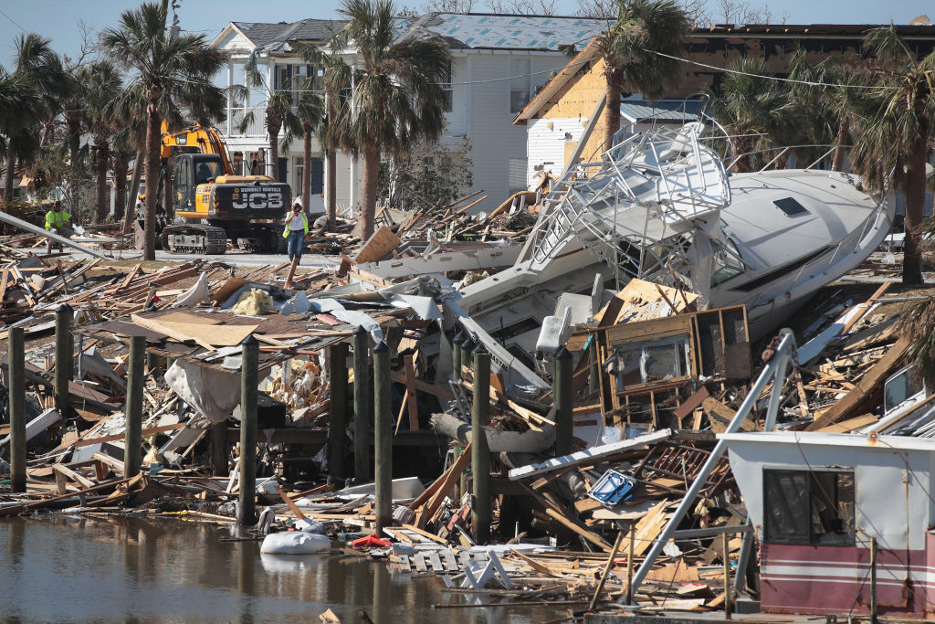 A boat washed ashore is among the damage from Hurricane Michael in Florida