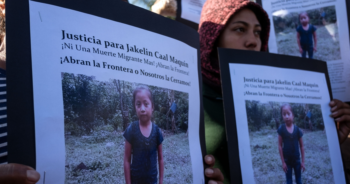 Central American migrants hold a demonstration Saturday in Tijuana, Mexico, over the death of 7-year old Jakelin Caal Maquin.