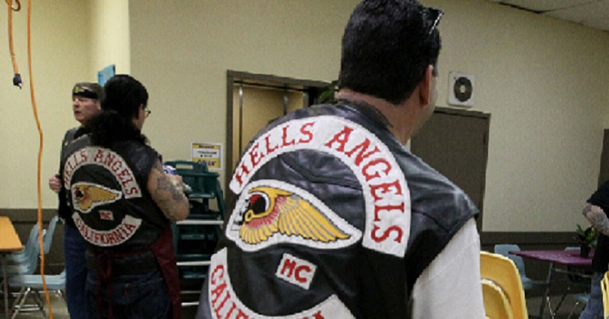 A member of the Hell's Angels shows a charitable side of the group in a 2009 file photo.