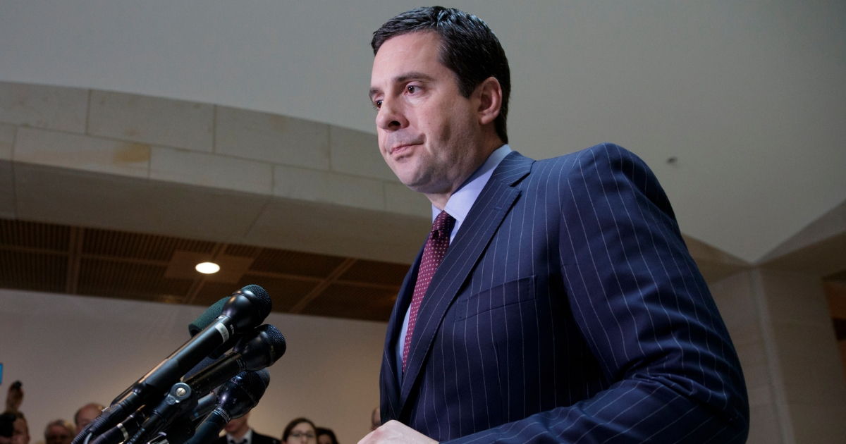 In this photo taken March 22, 2017, House Intelligence Committee Chairman Devin Nunes, R-Calif., gives reporters an update about the ongoing Russia investigation adding that President Donald Trump's campaign communications may have been "monitored" during the transition period as part of an "incidental collection," on Capitol Hill in Washington.