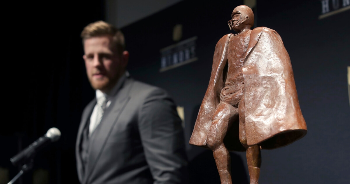 J. J. Watt poses in the press room with the Walter Payton 2017 NFL Man of the Year award at the 7th Annual NFL Honors in Minneapolis.