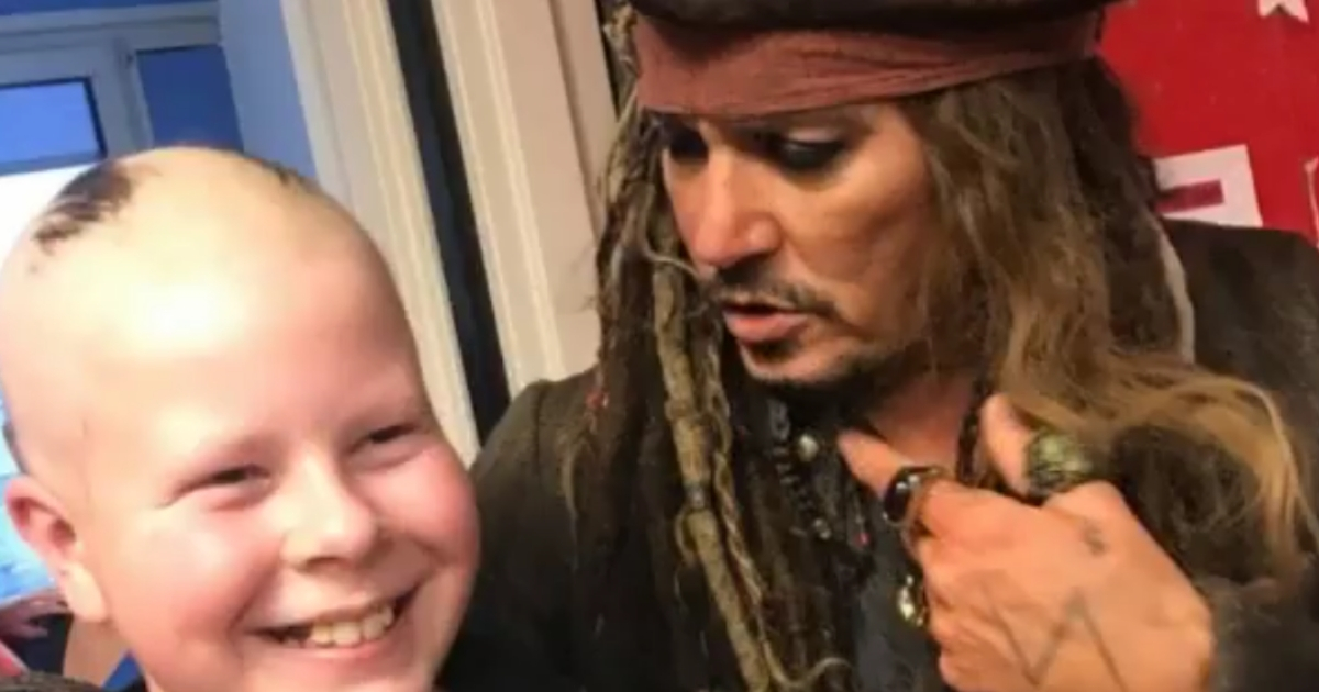 Johnny Depp as Capt. Jack Sparrow from "Pirates of the Caribbean" visits children being treated for cancer.