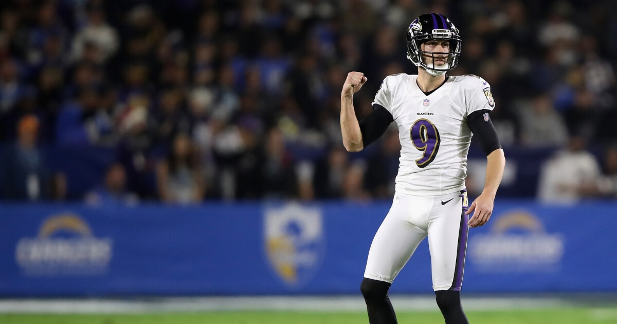 Justin Tucker of the Baltimore Ravens reacts after kicking a 56-yard field goal against the Los Angeles Chargers at StubHub Center on Saturday.