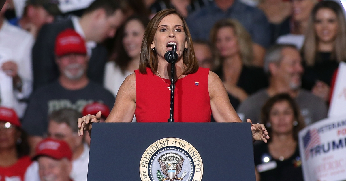 U.S. Senate candidate Martha McSally, R-Ariz, speaks during a rally for President Donald Trump at the International Air Response facility on Oct. 19, 2018, in Mesa, Arizona.