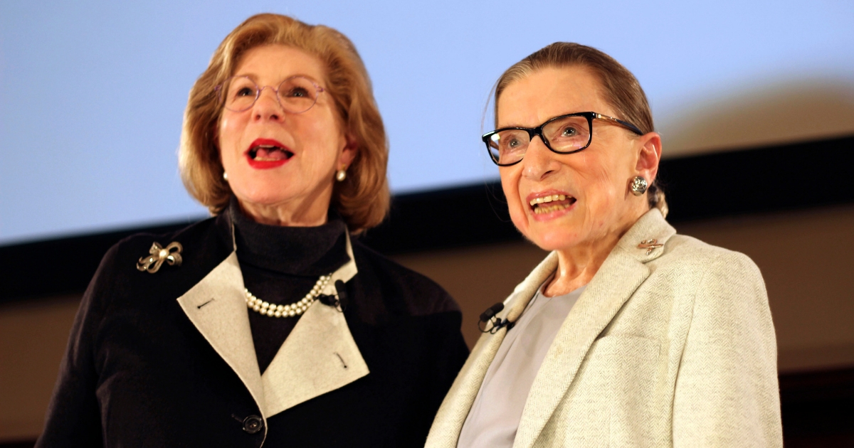 NPR's Nina Totenberg and U.S. Supreme Court Justice Ruth Bader Ginsburg stand onstage at the New York Academy of Medicine after doing a question and answer session as part of the Museum of the City of New York's David Berg Distinguished Speakers Series on Dec. 15, 2018, in New York.