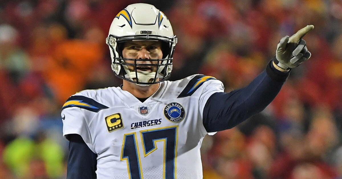 Quarterback Philip Rivers of the Los Angeles Chargers calls out instructions in Thursday night's game against the Kansas City Chiefs at Arrowhead Stadium.