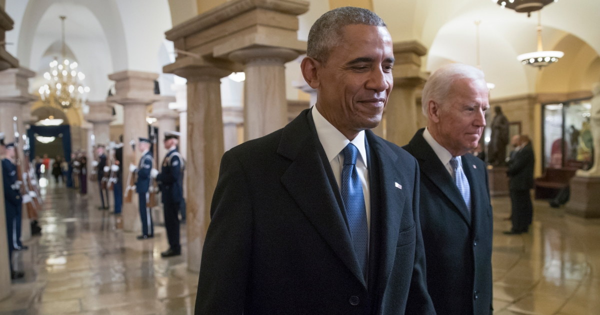 President Barack Obama and Vice President Joe Biden walk through the Crypt of the Capitol in Washington on Jan. 20, 2017, for Donald Trump's inauguration ceremony.