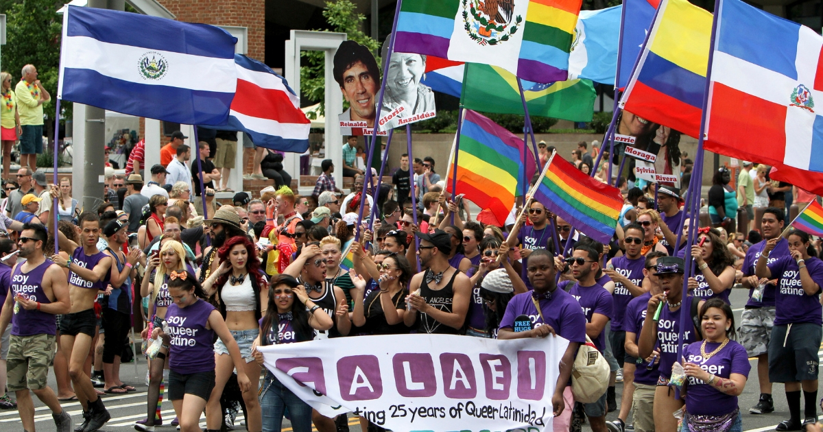 In this June 8, 2014, photo, people march in the annual Pride Day Parade in Philadelphia.