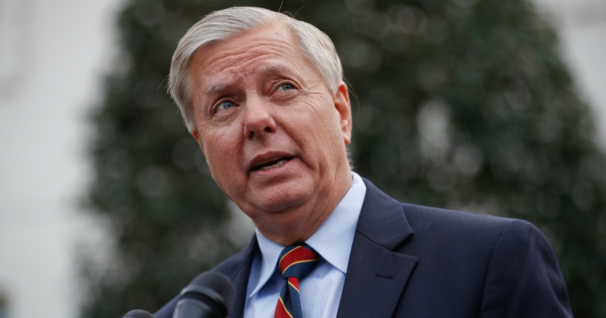 Sen. Lindsey Graham, R-S.C., speaks to members of the media outside the West Wing of the White House in Washington, after his meeting with President Donald Trump on Dec. 30, 2018.