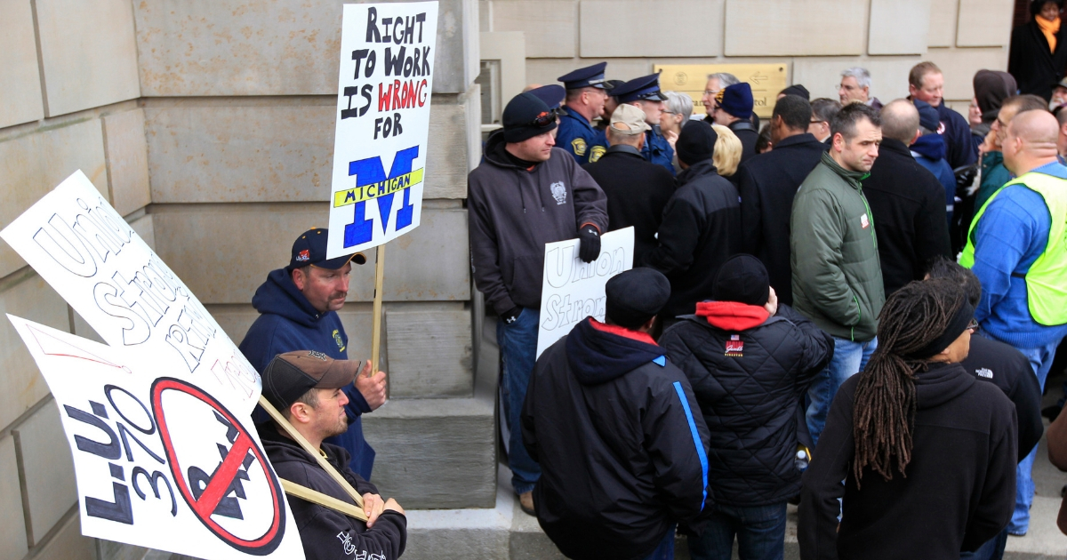 State police keep union workers from entering the Capitol in Lansing, Michigan, on Dec. 6, 2012, as Senate Republicans introduced right-to-work legislation in the waning days of the legislative session.