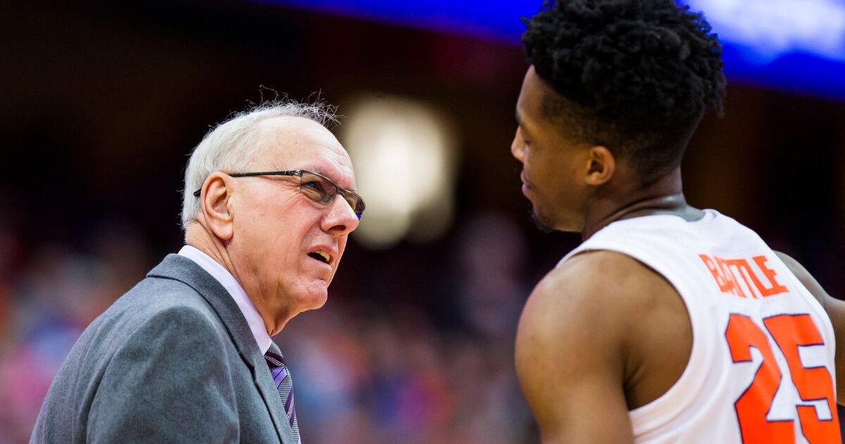 Head coach Jim Boeheim of the Syracuse Orange speaks with Tyus Battle during the first half against the Buffalo Bulls at the Carrier Dome on Tuesday.