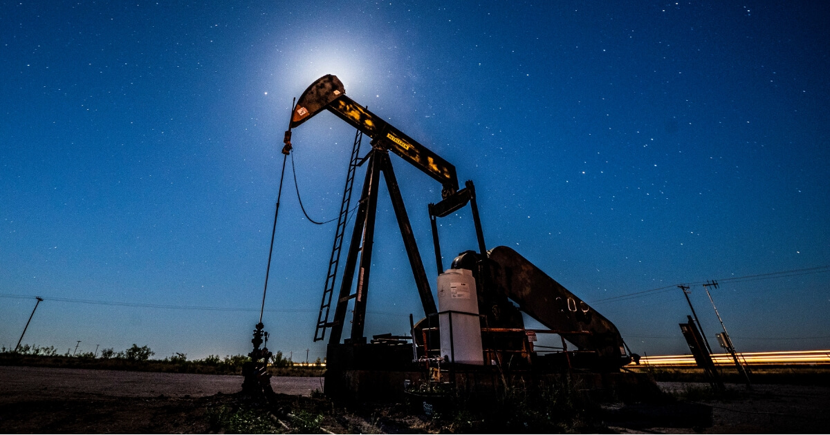 Workers extract oil from wells in Midland, Texas.