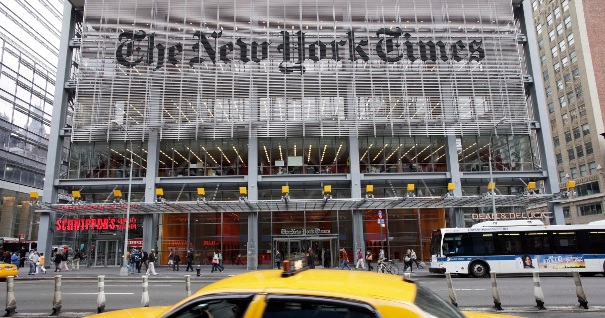 In this Oct. 18, 2011, photo, traffic passes the New York Times building, in New York.
