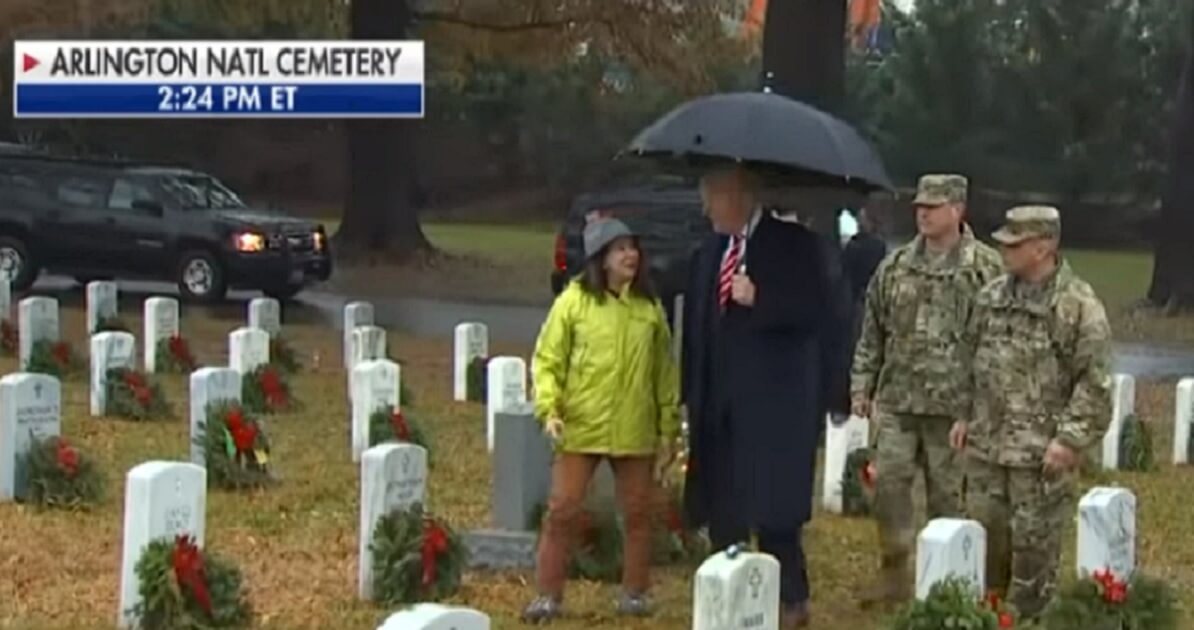 President Donald Trump pays a visit Saturday to Arlington National Cemetery in honor of Wreaths Across America day.