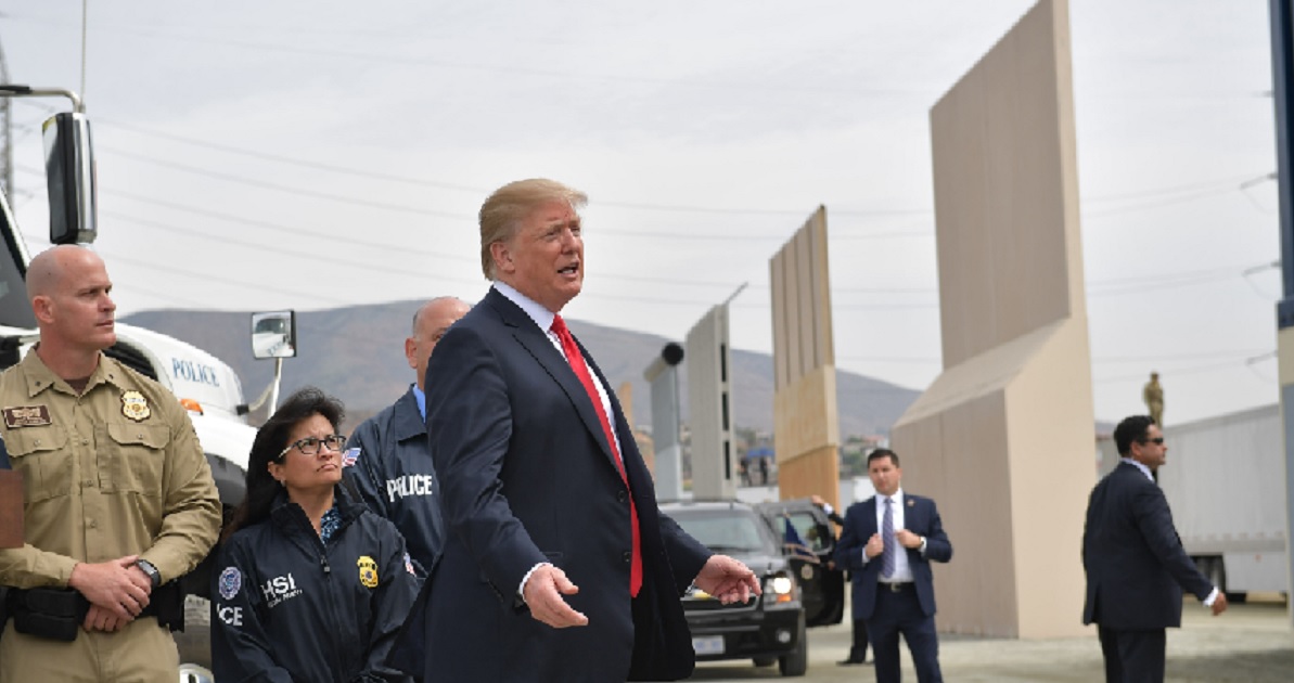 President Donald Trump inspects protoypes of a proposed border wall during a March visit to San Diego.