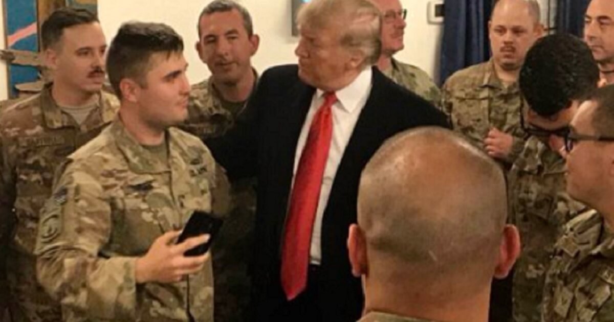 President Donald Trump meets with U.S. troops in Iraq on a surprise Christmas visit.