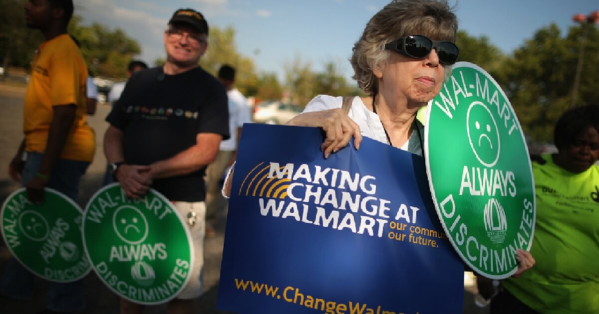 Demonstrators protest outside a Walmart in Hyattsville, Maryland, in September 2013.