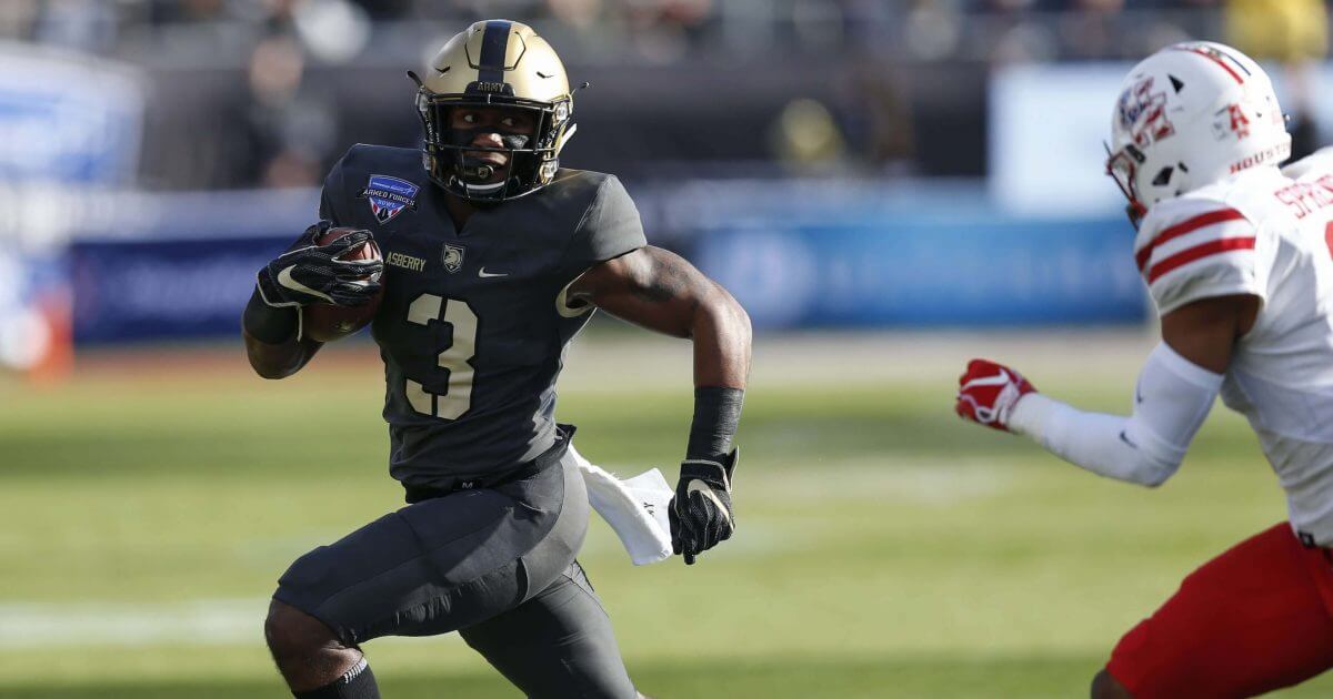 Army running back Jordan Asberry (3) rushes the ball against Houston during the first half of Armed Forces Bowl NCAA college football game on Saturday in Fort Worth, Texas.