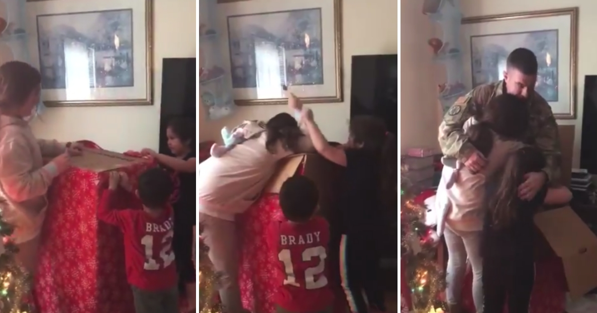 Three little kids open a giant box to reveal their dad hiding inside.