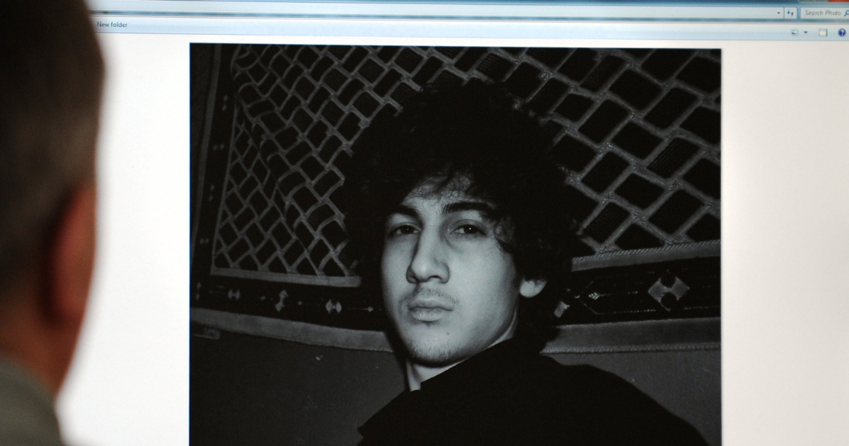 A man looks in Moscow on April 19, 2013, at a computer screen displaying an undated picture the 19-year-old Dzhokhar Tsarnaev posted on his is page in VKontakte, a Russian social media site.