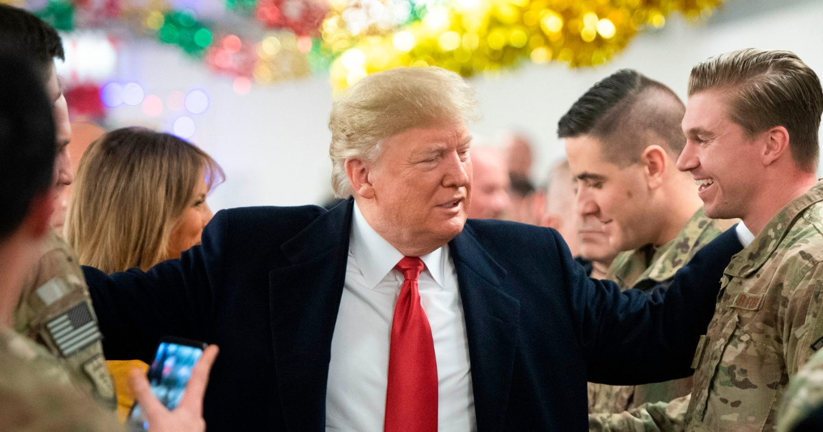 President Donald Trump visits troops over Christmas.