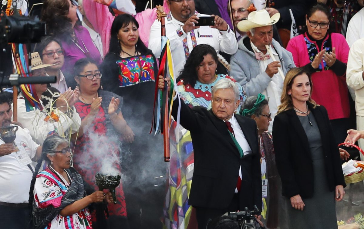 Mexico's new President Andres Manuel Lopez Obrador, center, participates in a traditional indigenous ceremony in Mexico City on Saturday.