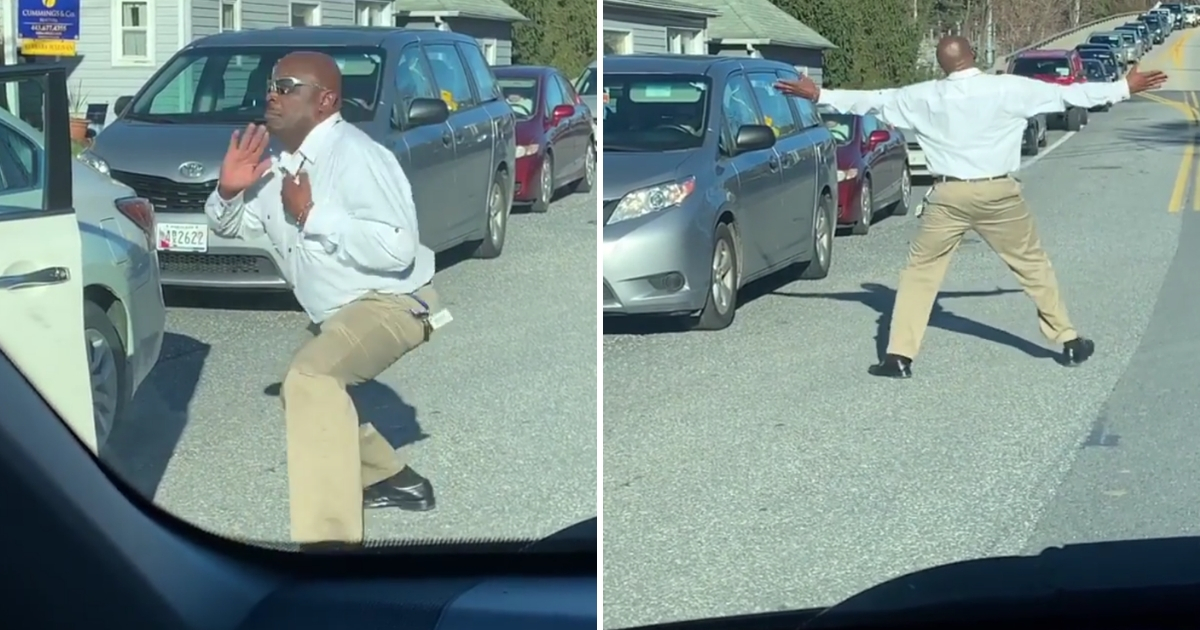 unidentified man dancing in traffic