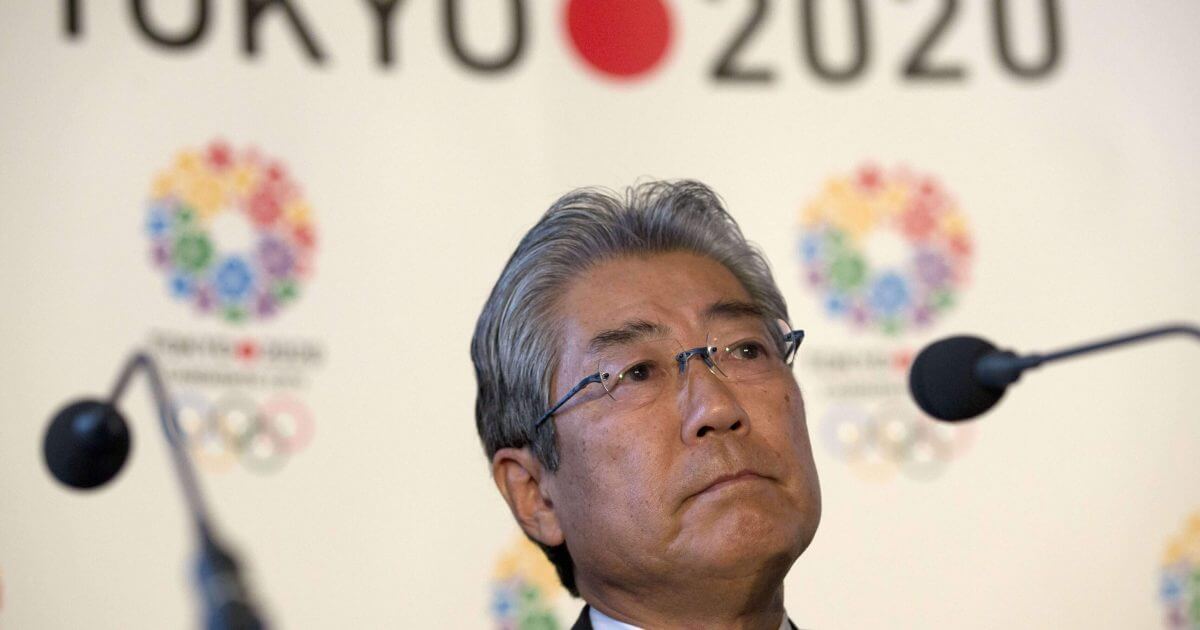 Tsunekazu Takeda, president of the Tokyo 2020 Olympic games bid, listens to a question from the media during the first international presentation of the Tokyo 2020 Olympic Games bid in London on Jan. 10, 2013. France's financial crimes office says International Olympic Committee member Takeda is being investigated for corruption related to the 2020 Tokyo Olympics.