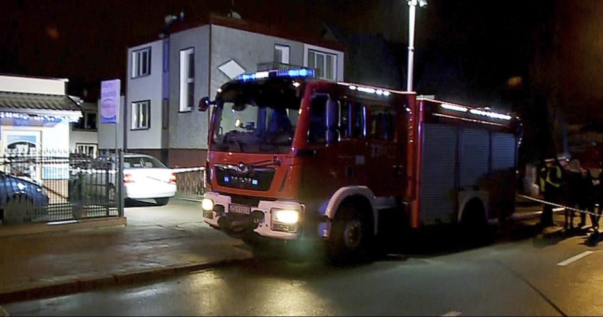 A fire engine stands outside an "Escape Room" game location in Koszalin, northern Poland, on Jan. 4, 2019