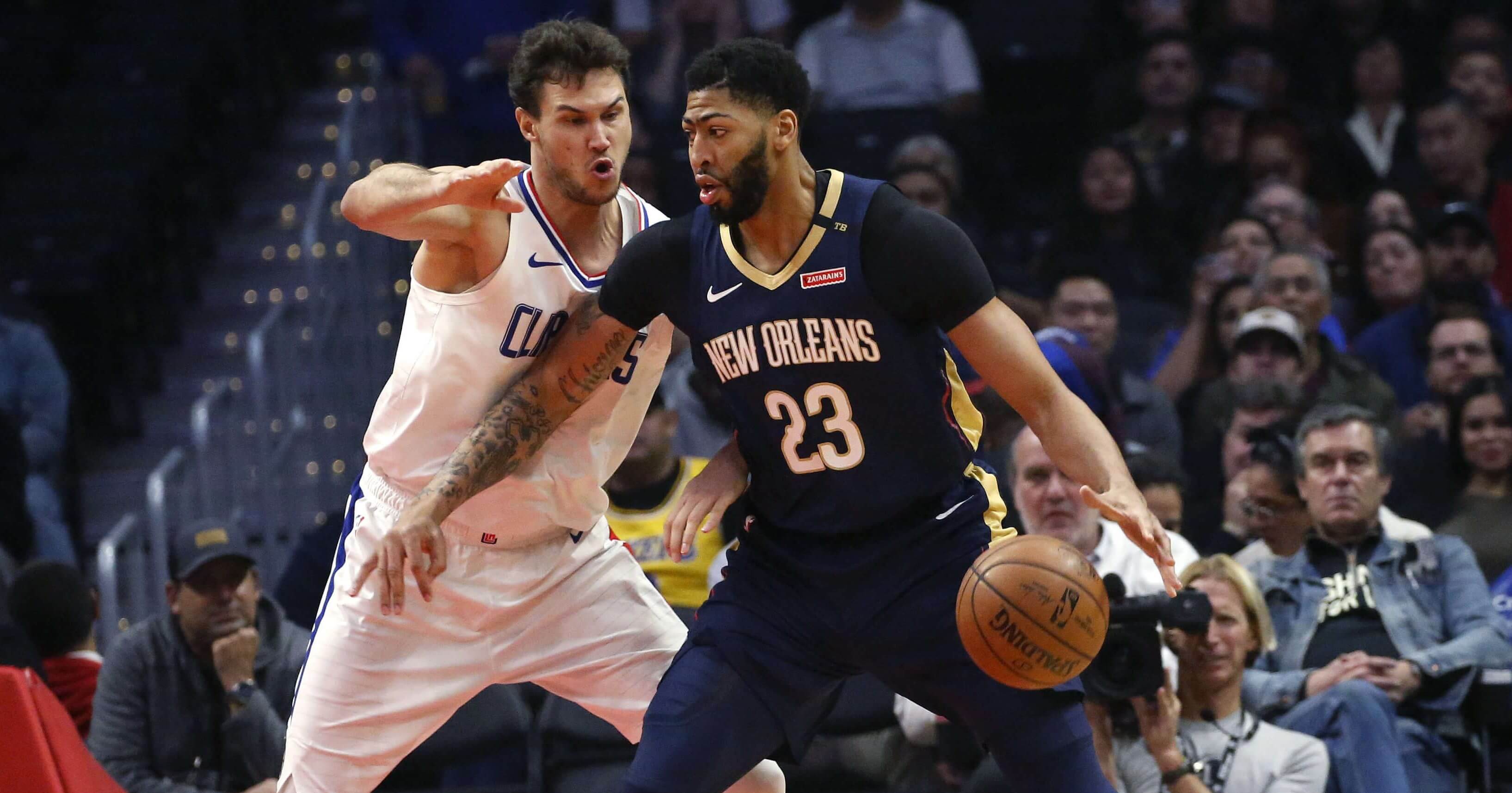 New Orleans Pelicans star Anthony Davis, right, dribbles against the Los Angeles Clippers' Danilo Gallinari during a Jan. 14 game in Los Angeles.