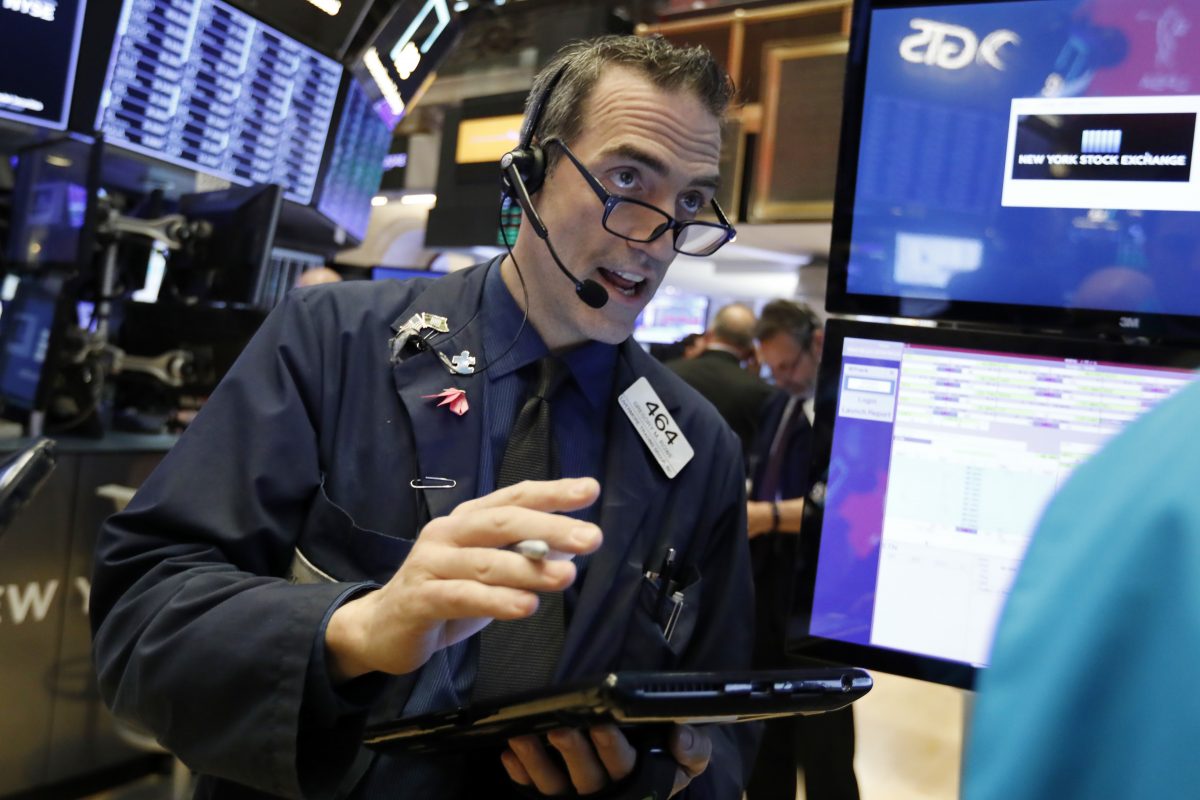 Trader Gregory Rowe works on the floor of the New York Stock Exchange, Wednesday, Jan. 9, 2019.