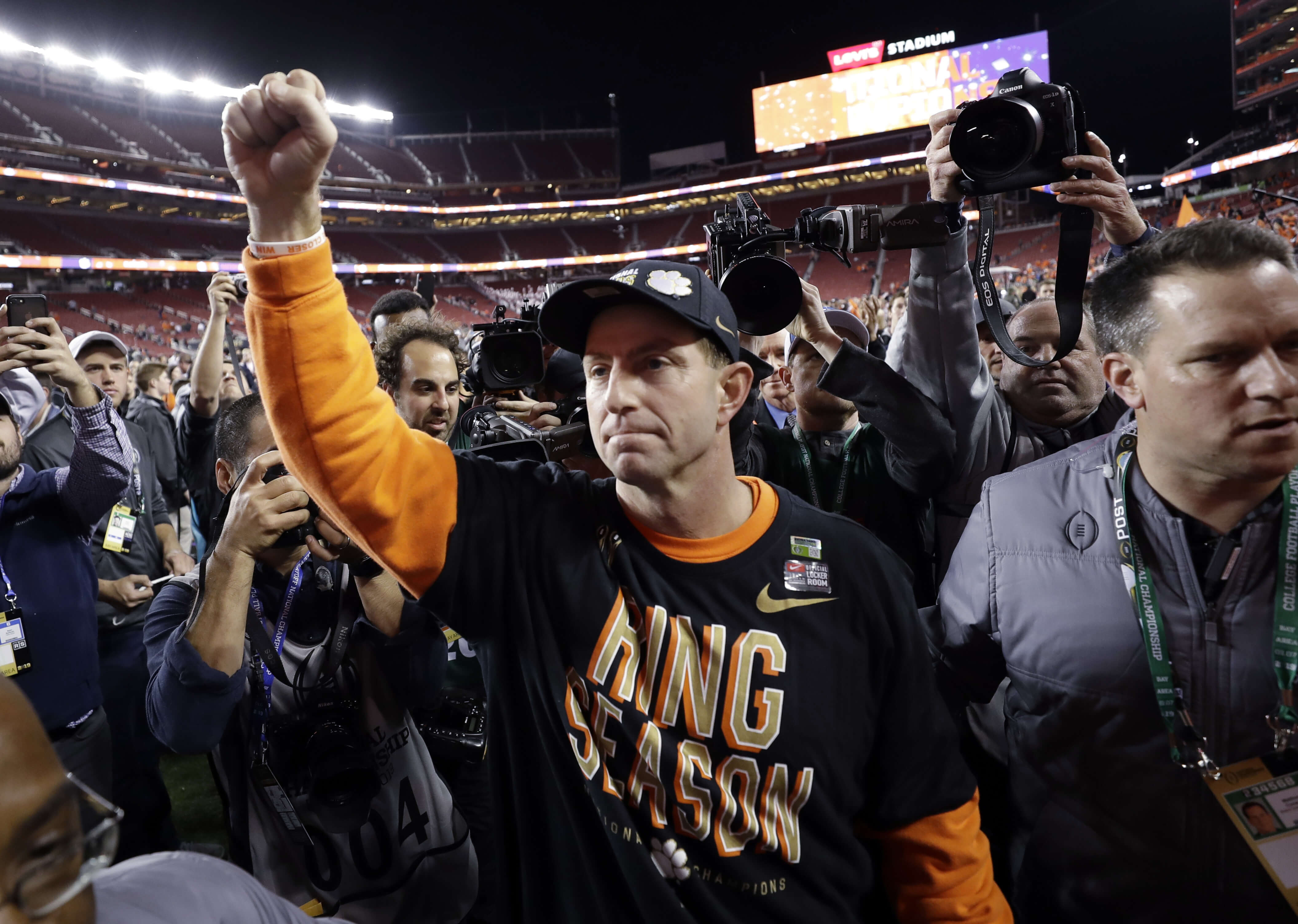 Clemson football coach Dabo Swinney celebrates Monday night after his Tigers crushed Alabama to finish 15-0 and win the national championship.