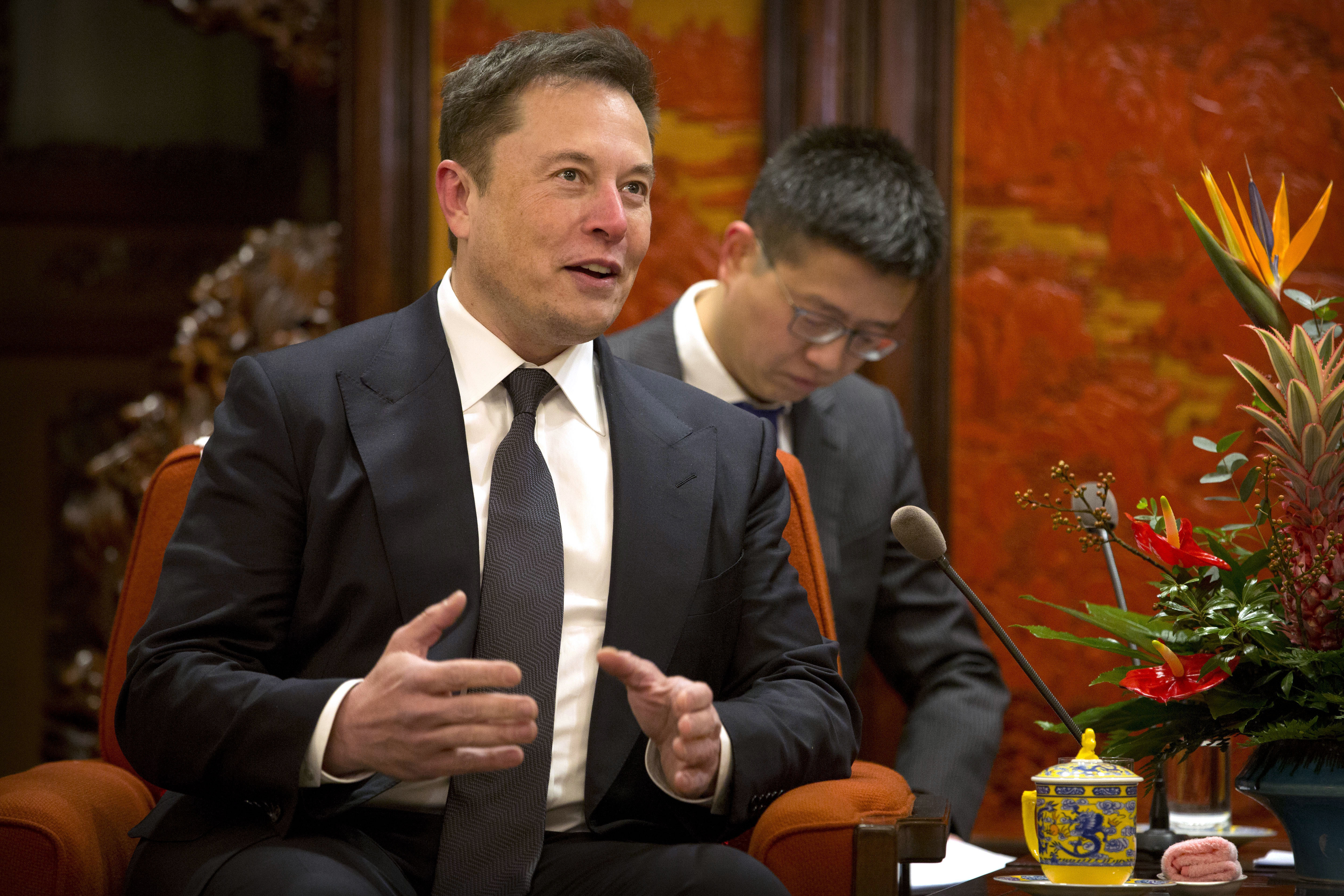 Tesla CEO Elon Musk speaks during a meeting with Chinese Premier Li Keqiang at the Zhongnanhai leadership compound in Beijing on Jan. 9.