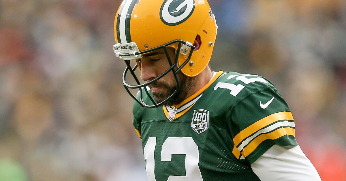Aaron Rodgers of the Green Bay Packers looks down